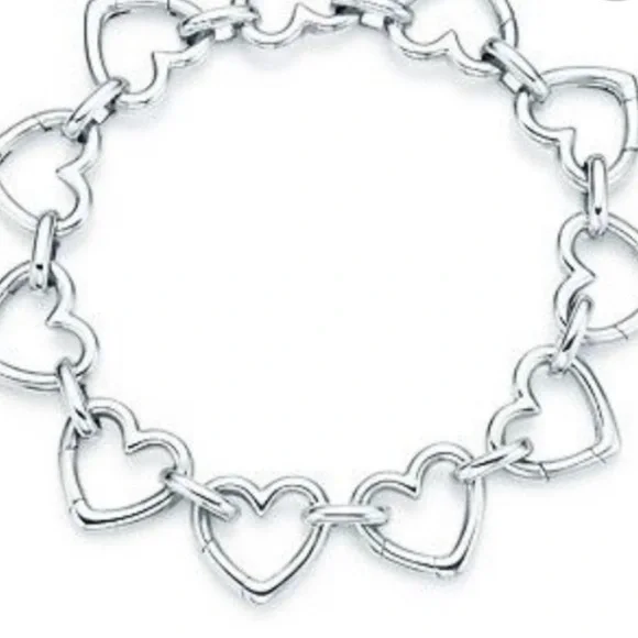Tiffany & Co.  Rare clasping hearts charm bracelet - Picture 2 of 3